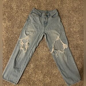 light wash jeans ripped in the knees